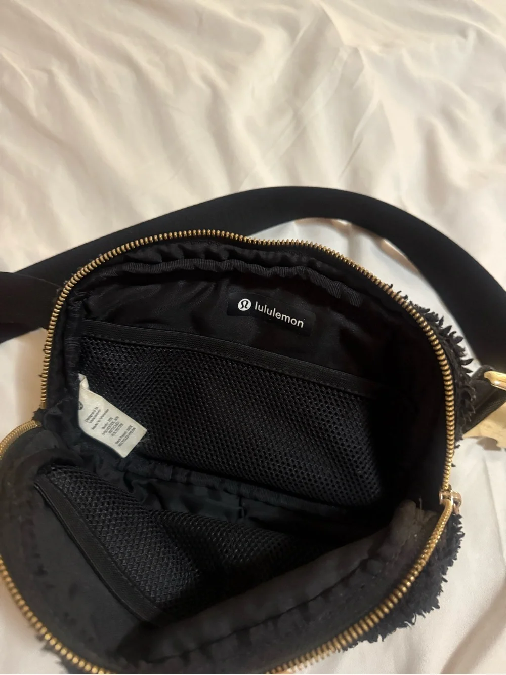 lululemon athletica Black Sherpa Waist Pouch with Gold Accent